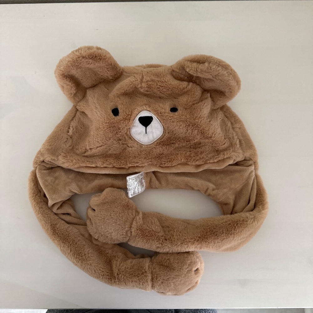 Brown fuzzy bear hat with movable floppy ears
